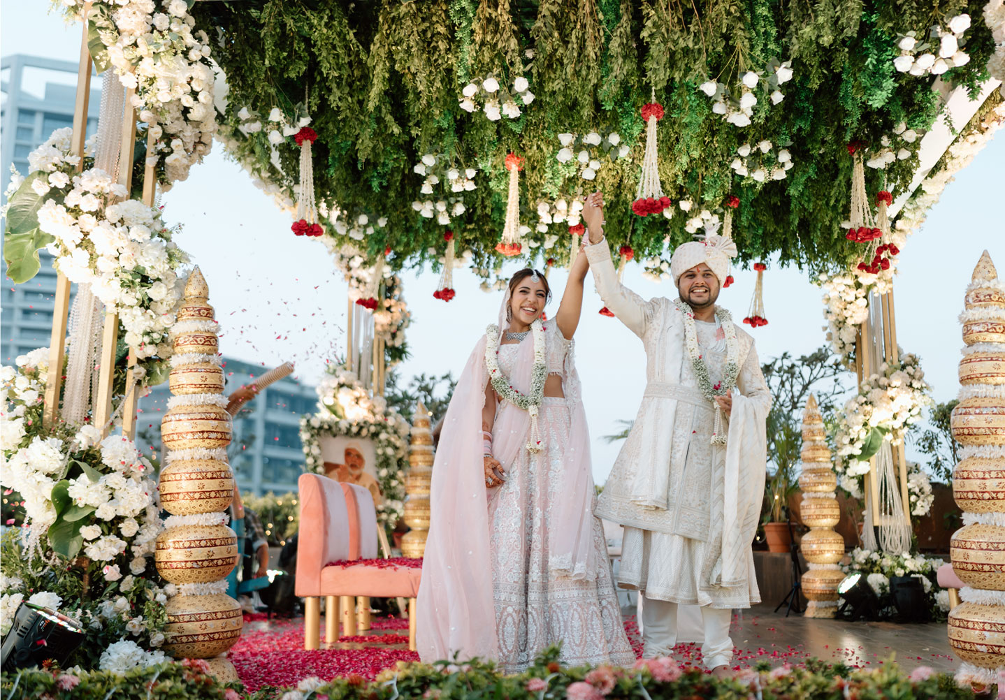 Elegant floral arrangement with classical statues