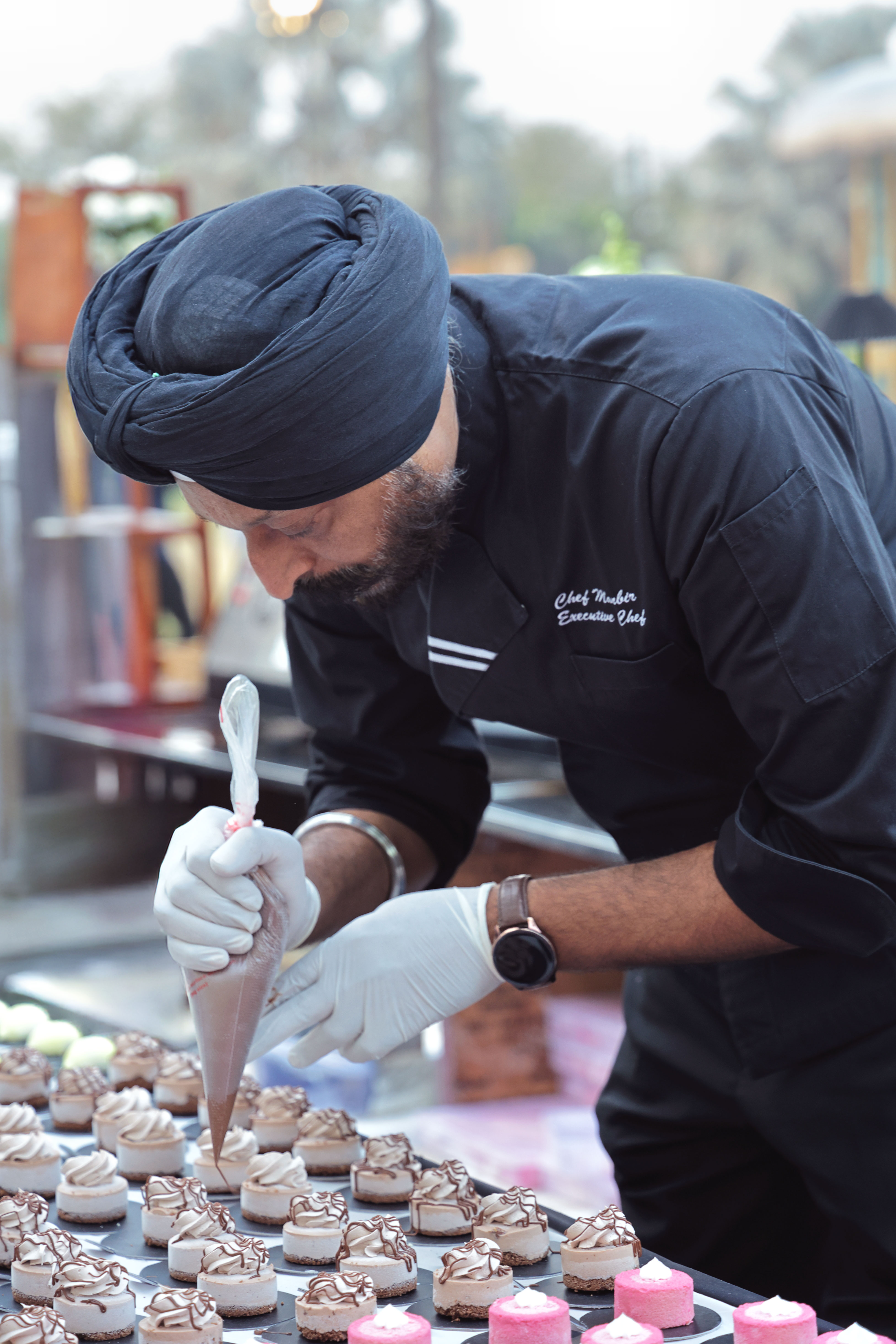 Executive chef preparing desserts with precision